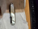 pearl scales multi tool pocket
knife - 5 of 7