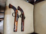 pair of
officers /
target
pistols
.51 bore - 2 of 11