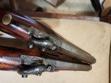pair of
officers /
target
pistols
.51 bore - 9 of 11