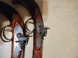 pair of
officers /
target
pistols
.51 bore - 6 of 11