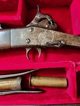 first
model
maynard rifle
in
case - 8 of 13