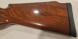 Pre-Owned Caesar Guerini Invictus V Impact Gold Over/Under 12 ga. 32