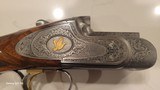 Pre-Owned Caesar Guerini Invictus V Impact Gold Over/Under 12 ga. 32