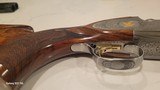 Pre-Owned Caesar Guerini Invictus V Impact Gold Over/Under 12 ga. 32