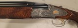 Pre-Owned Caesar Guerini Invictus V Impact Gold Over/Under 12 ga. 32