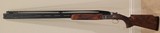 Pre-Owned Caesar Guerini Invictus V Impact Gold Over/Under 12 ga. 32