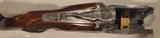 Pre-Owned Caesar Guerini Invictus V Impact Gold Over/Under 12 ga. 32