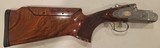 Pre-Owned Caesar Guerini Invictus V Impact Gold Over/Under 12 ga. 32