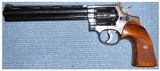 Colt Python 8-Inch-Barreled Smith & Wesson K-38 Masterpiece 5-Screw (