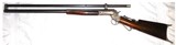 Stevens Tip-Up Schuetzen Rifle; 25-35 Stevens & Maynard; Half-Round/Octagon Barrel; Original Malcom Scope