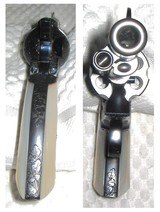 Colt 2nd Generation Single Action Army Revolver; 38 Special;
51/2 Inch; Engraved (non Factory) Genuine Pearl Grips - 4 of 10