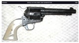 Colt 2nd Generation Single Action Army Revolver; 38 Special;
51/2 Inch; Engraved (non Factory) Genuine Pearl Grips - 1 of 10