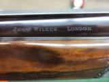 John Wilkes, London Best side lock, O/U, 20ga., 29 inch barrels,Briley choke tubes. As new condition - 13 of 15