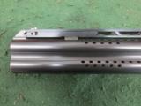 Perazzi MX2000/3, O/U barrels. 34" length. Wilkinson tuned. Three notch P.O.I.- 3 of 6