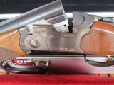 Beretta 682 sporting combo. 12ga. and 20ga. Briley ultra lights .410 and 28ga. J and S Air cushion stock. Multi chokes. - 4 of 12