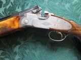 Beretta SO5 12ga. Side Lock, Exhibition wood, 32 inch barrel Sporting model, Isis recoil system