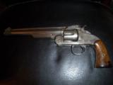Smith & Wesson American 3 digit serial. Near mint.
- 1 of 4
