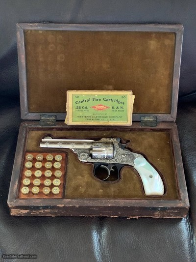 Factory Cased Panel scene engraved Smith & Wesson .38 cal. Revolver. Circa 1880.