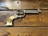 Colt Single Action .45 caliber ivory grips. Gold-Plated.