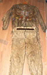 1800's BLACKFOOT INDIAN BEADED ELK HIDE OUTFIT. - Image 1 of 6