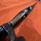 REMINGTON MODEL 7, IN THE RARE LIGHT RECOIL 7MM-08 CALIBER, PREMIUM WALNUT STOCK, 99+% CONDITION. - 14 of 15