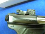 RUGER MARK III TALO EDITION
GOVERNMENT TARGET WITH FLASH SUPPRESSOR, REMOVABLE FOR THREADED BARREL. - 5 of 8