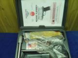 RUGER P89
CALS. 9MM AND 30 LUGER CONVERTIBLE STAINLESS 100% NEW IN FACTORY CASE! - 1 of 10