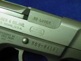 RUGER P89
CALS. 9MM AND 30 LUGER CONVERTIBLE STAINLESS 100% NEW IN FACTORY CASE! - 6 of 10