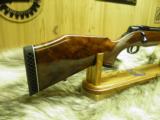 COLT SAUER SPORTING RIFLE CAL: 7 REM. MAG. WITH BEAUTIFUL FIGURE WOOD, 100% NEW AND UNFIRED 