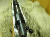 WEATHERBY VANGUARD "SUB-MOA" CAL: 257 WBY. MAG. SNOW CAMMO "NEW IN BOX" - 9 of 12