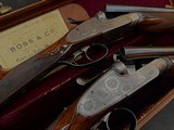 Exceptionnal 1965 Pair of Deluxe grade self Opening 16 gauge BOSS and CO shotguns - 2 of 11