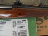 Remington Model 700
"CUSTOM
DELUXE"
.300 RUM
ENHANCED ENGRAVING - 7 of 20