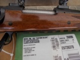 Remington Model 700
"CUSTOM
DELUXE"
.300 RUM
ENHANCED ENGRAVING - 5 of 20