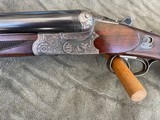 CHRISTOPH FUNK ** EJECTOR ** DRILLING
DOUBLE 12 GAUGE OVER 30-30 WIN.
SUPER ENGRAVING WITH CASE COLORS REMAINING - 1 of 24