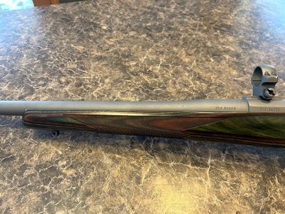 Ruger 77 Hawkeye Predator 204 Ruger matte stainless steel with factory scope rings - Image 11 of 12