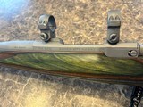Ruger 77 Hawkeye Predator 204 Ruger matte stainless steel with factory scope rings - Image 9 of 12