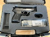 Sig Sauer P230 7.65 (32 auto) with original case and two magazines Rare find here!