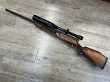 Tikka Bolt action M595 RH, 22-250 Made in Finland with Tasco 24x44 scope