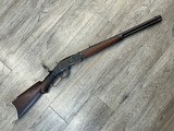 Winchester model 1873 in 32 cal. Lever action rifle with 21” octagon bbl, with special butt end - 1 of 10