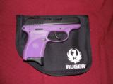 RUGER
LC9-PG,
9-MM,
PURPLE / BLACK,
7 ROUND
MAGAZINE,
Model #:
LC9 Ruger Lady Lilac Talo Edition - 2 of 12