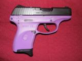 RUGER
LC9-PG,
9-MM,
PURPLE / BLACK,
7 ROUND
MAGAZINE,
Model #:
LC9 Ruger Lady Lilac Talo Edition - 3 of 12