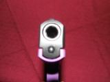 RUGER
LC9-PG,
9-MM,
PURPLE / BLACK,
7 ROUND
MAGAZINE,
Model #:
LC9 Ruger Lady Lilac Talo Edition - 8 of 12