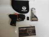 RUGER
LCR- LM
380
ACP
WITH
BUILT
IN
LASER,
6 + 1
ROUNDS - 3 of 19
