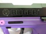 RUGER
SR22PG,
22 L.R.,
PURPLE / BLACK,
2-10 ROUND
MAGAZINES,
N.I.B. - 5 of 15