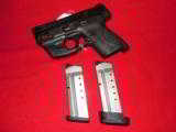 S&W,
M&P- SHIELD,
WITH
LASER,
40
S&W,
COMPACT,
3.1" BARREL,
TWO MAGAZINES,, N.I.B. - 10 of 19