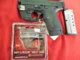 S&W,
M&P- SHIELD,
WITH
LASER,
40
S&W,
COMPACT,
3.1" BARREL,
TWO MAGAZINES,, N.I.B. - 2 of 19