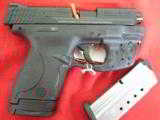 S&W,
M&P- SHIELD,
WITH
LASER,
40
S&W,
COMPACT,
3.1" BARREL,
TWO MAGAZINES,, N.I.B. - 4 of 19