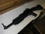 HI - POINT
MODEL 995TS,
9 - MM
CARBINE
WITH
SCOPE,
10
ROUND
MAGAZINE,
FACTORY
NEW
IN
BOX - 12 of 15