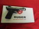 RUGER- LITE,
MODEL # 03906,
22/45LT 22LR PST 4.4TB CBA,,
Threaded Barrel,
Finish: Cobalt Anodize,
TWO
10 RD. MAGS - 12 of 18
