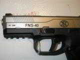 F.N.S-.40
S&W,
ON
SALE
NIGHT
SIGHTS,
COMES WITH--
3- 14
ROUND MAGS
NEW IN BOX--
STAINLESS
STEEL - 4 of 19